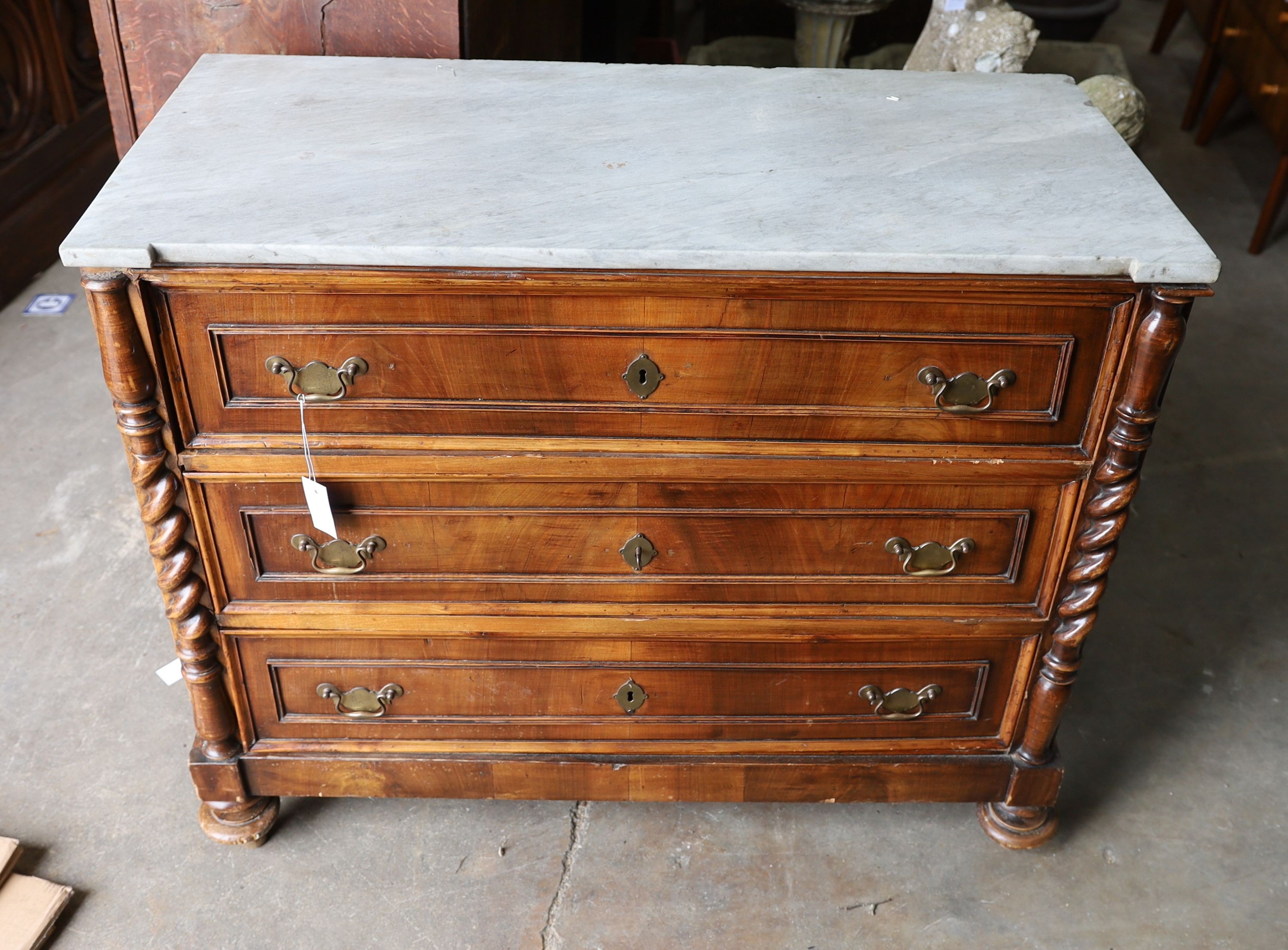 A 19th century French marble top walnut commode, width 109cm, depth 52cm, height 91cm